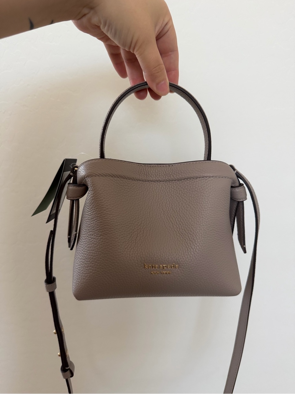 kate spade pebble leather mini top-handle bag in taupe